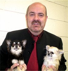 Photo of Mr S Rooney with his longcoat
Best of Breed Copymear Kiss In The Dark at
Yorone, who went on to Best in Show, and
Best Puppy Yorone Lights Camera Action